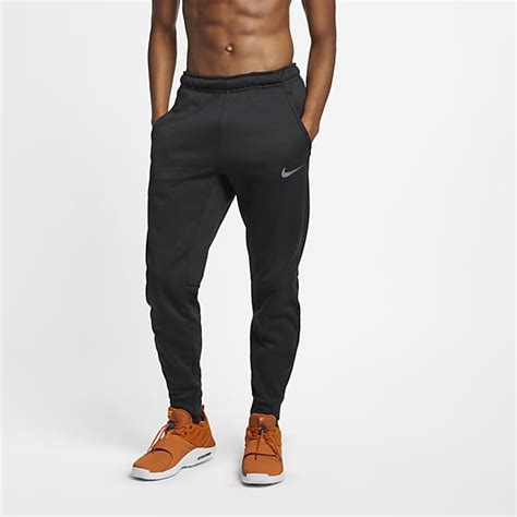 grijze nike joggingbroek|Joggingbroeken en trainingsbroeken voor heren .